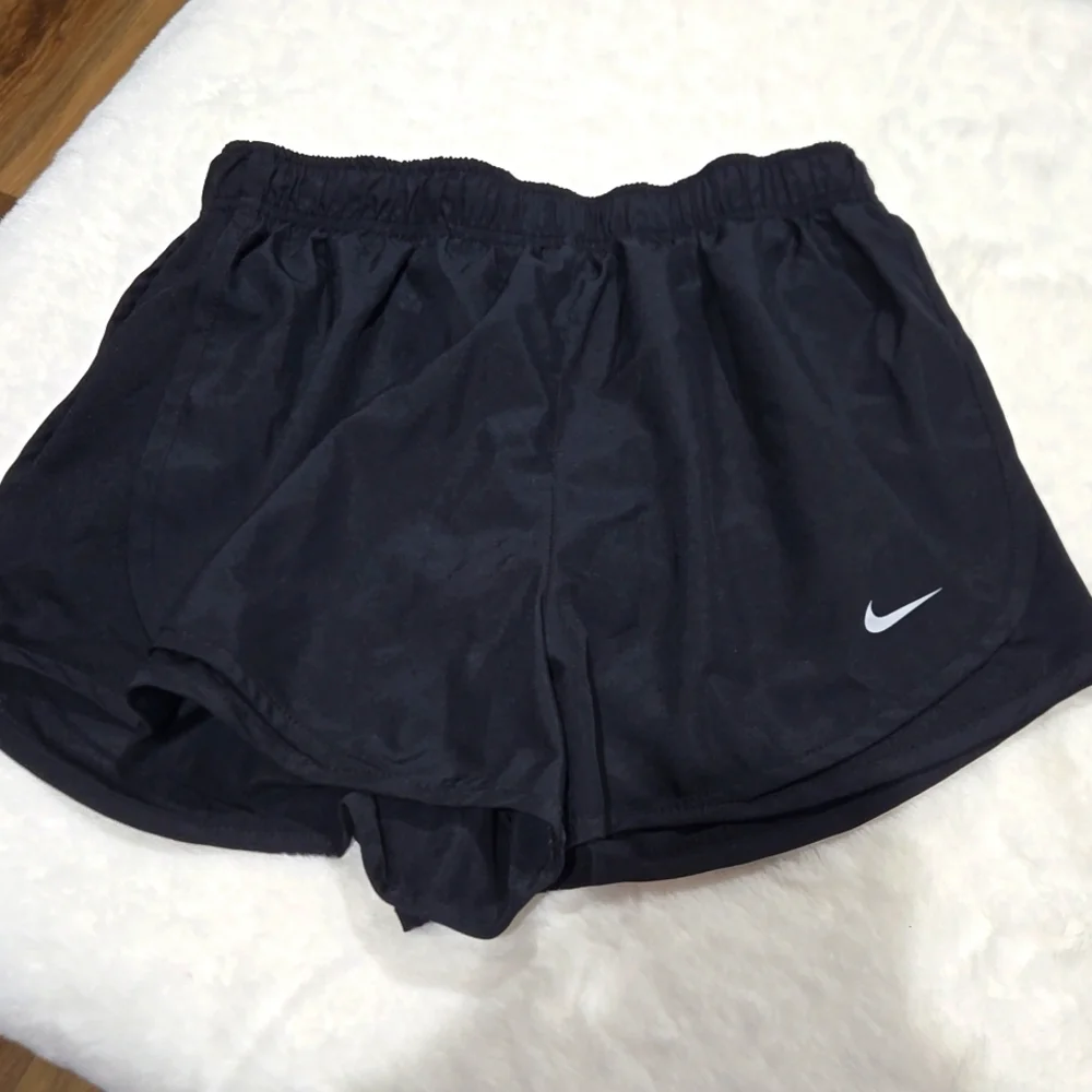 Nike Dri-Fit black lined women's shorts draw-string size medium